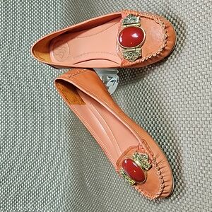 BCBG Leather Loafers.  Gold Embellishment with Coral Colored Jewel.  Size 6.5 B